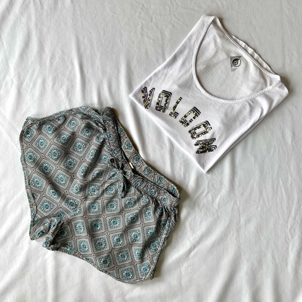 Volcom shirt with patterned shorts.